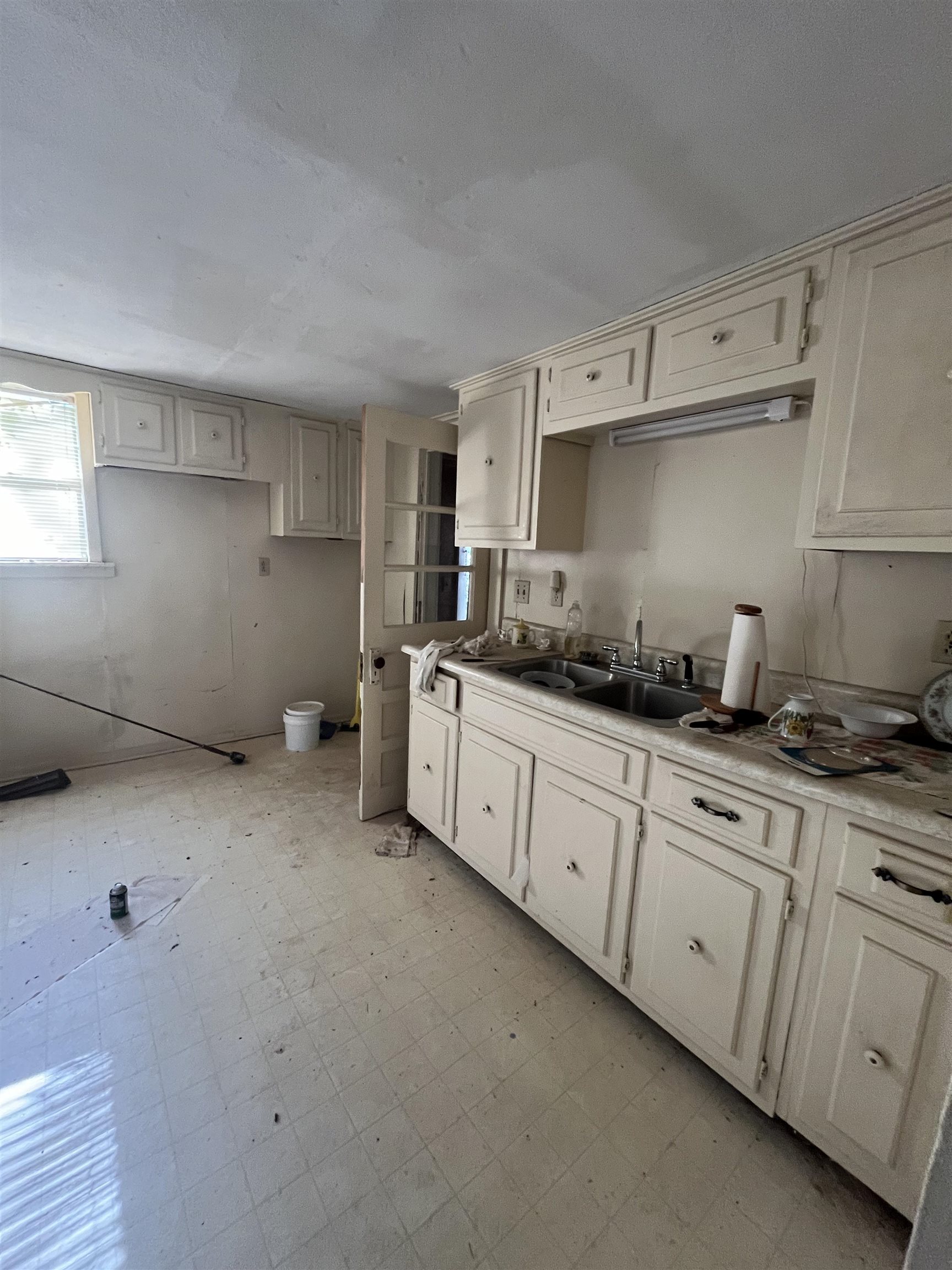46595 Highway 69 Saltillo, TN 38370 - Photo 11 of 11 a kitchen with cabinets and window