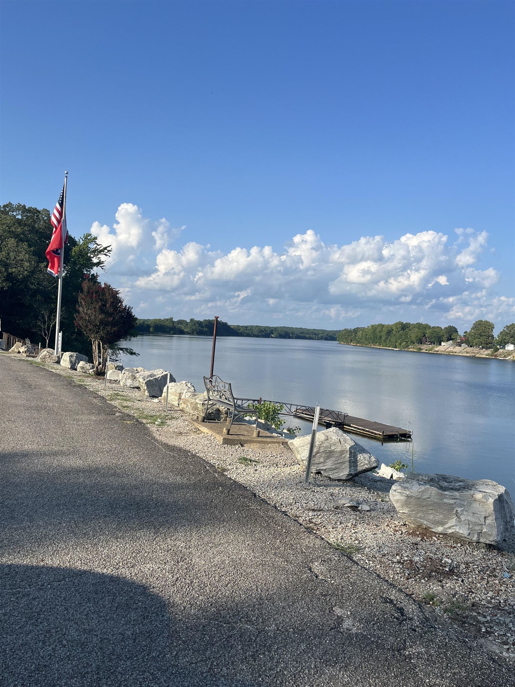 46595 Highway 69 Saltillo, TN 38370 - Photo 5 of 11 a view of a lake with a table and chairs