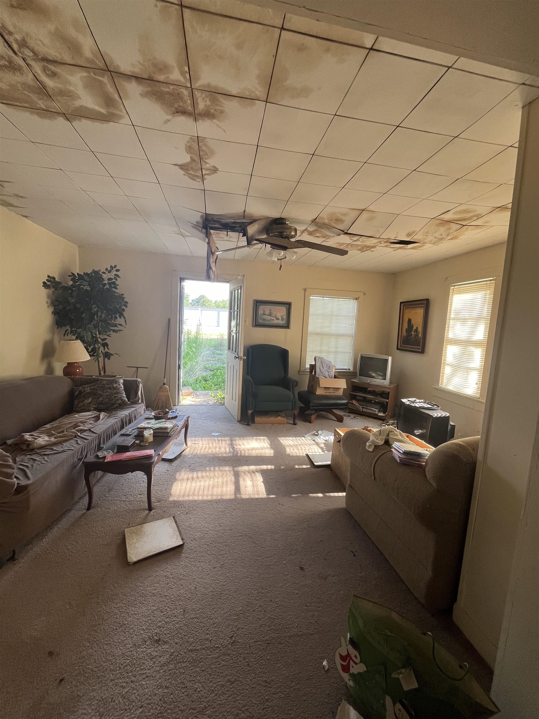 46595 Highway 69 Saltillo, TN 38370 - Photo 6 of 11 a living room with furniture and a flat screen tv