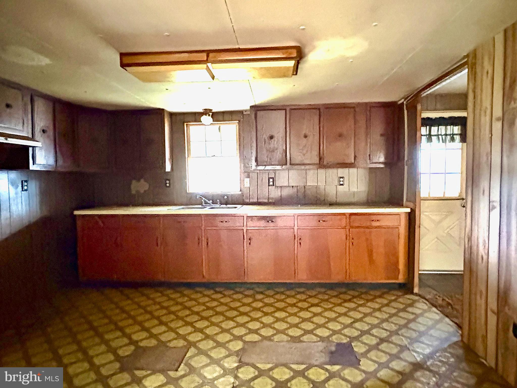 127 Evergreen Road Blanchard, PA 16826 - Photo 7 of 14 a room with wooden cabinets