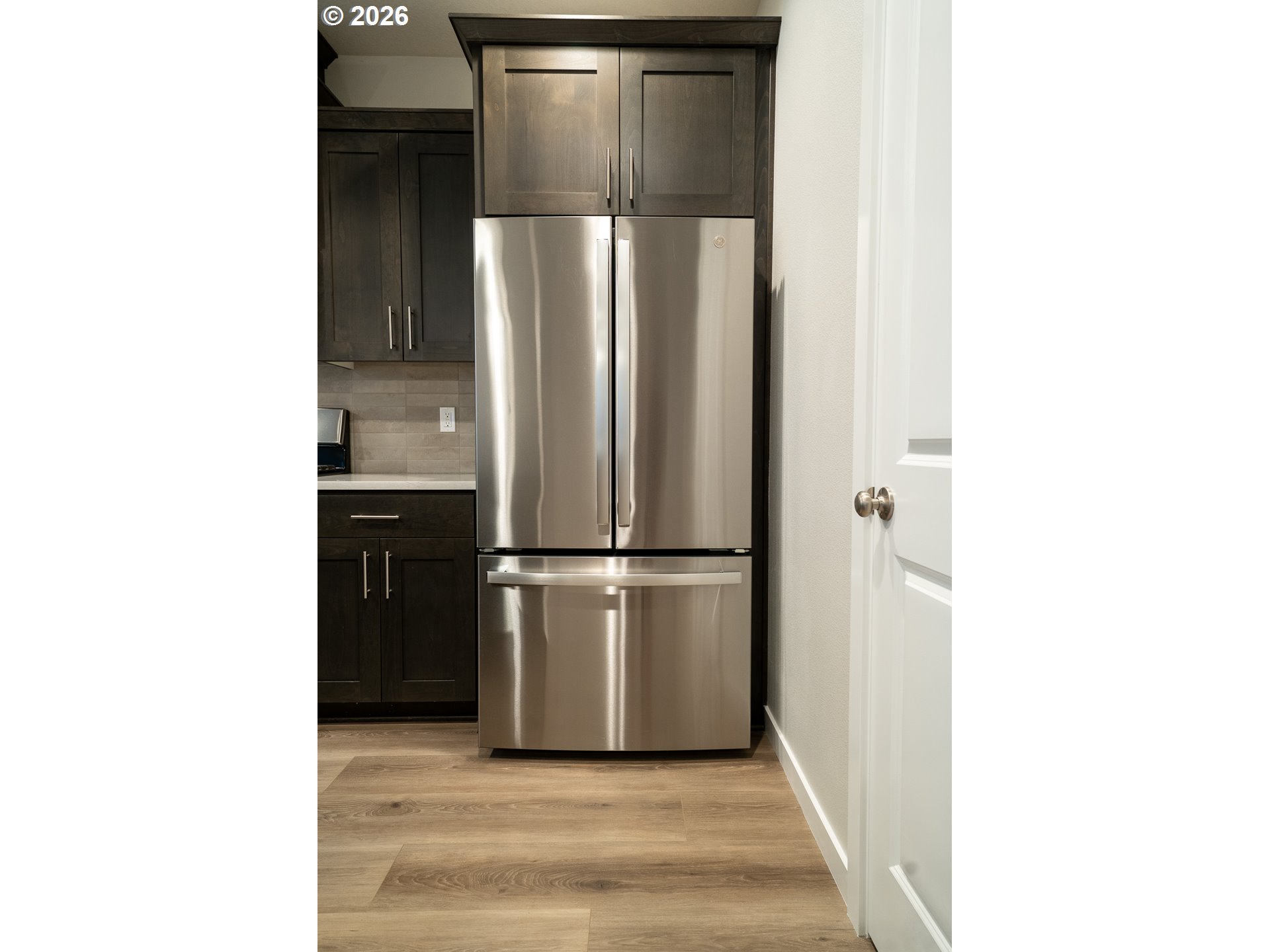 10495 Southeast Heritage Road Happy Valley, OR 97086 - Photo 15 of 46 a view of a kitchen from the hallway