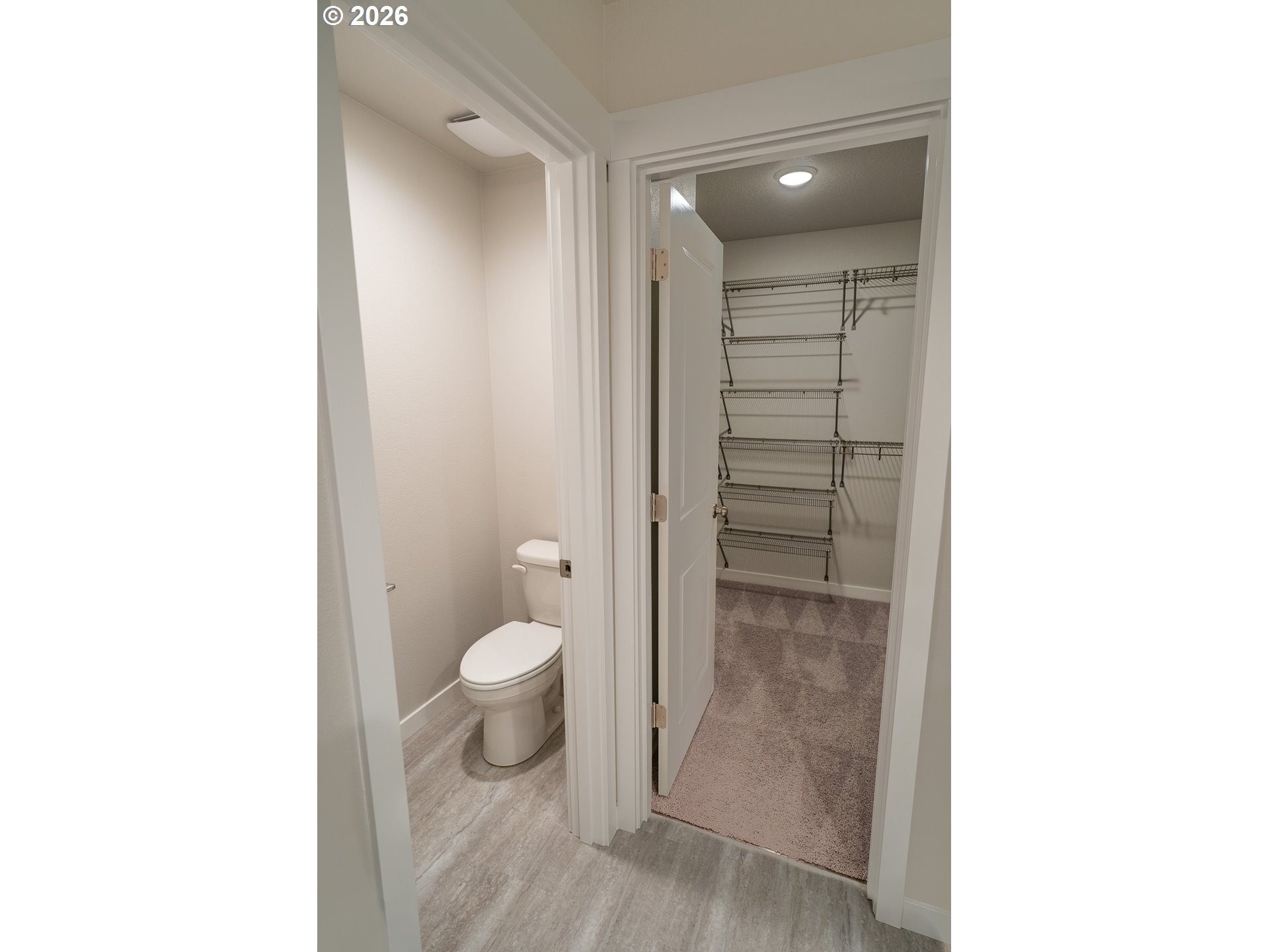 10495 Southeast Heritage Road Happy Valley, OR 97086 - Photo 30 of 46 a view of a bathroom from a hallway