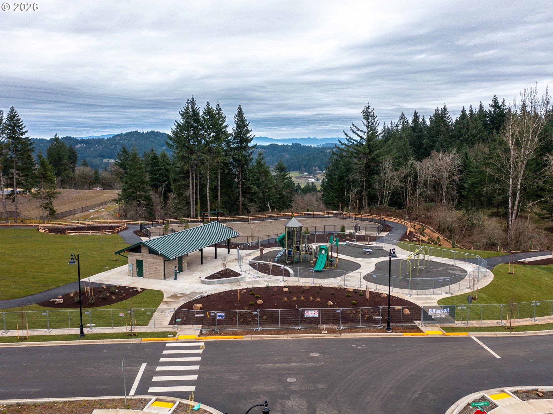 10495 Southeast Heritage Road Happy Valley, OR 97086 - Photo 45 of 46 a view of a swimming pool with lounge chairs in patio