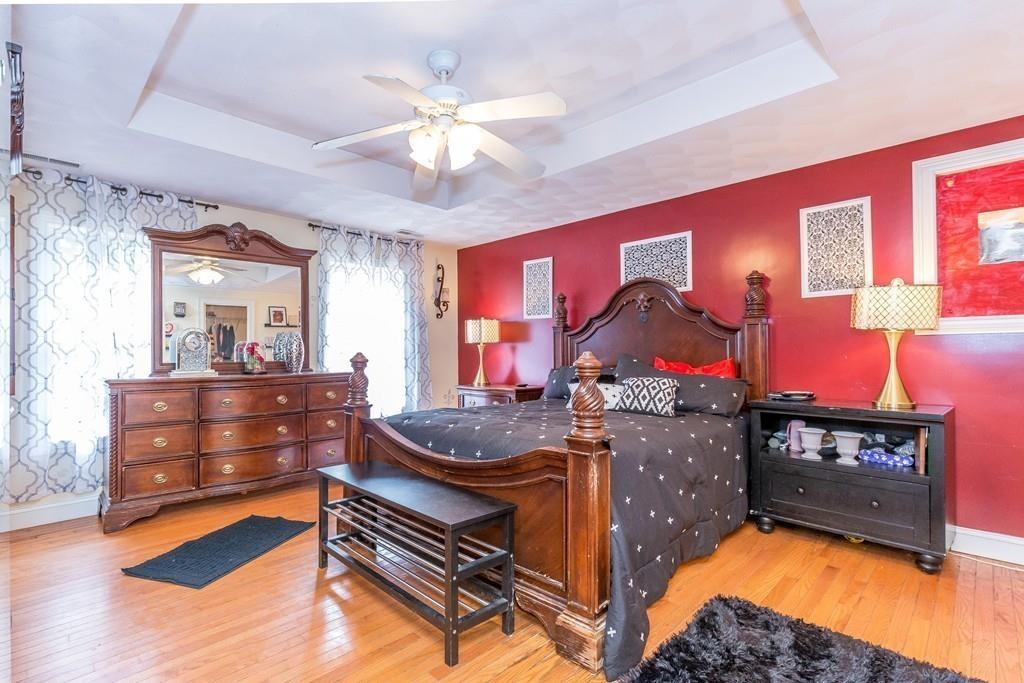 160 Scribner Road Tyngsborough, MA 01879 - Photo 20 of 31 a room with stainless steel appliances kitchen island granite countertop furniture and a fireplace