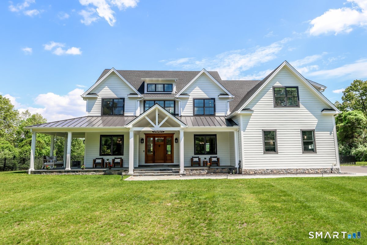 2 Pond View Lane Sherman, CT 06784 - Photo 3 of 40 a front view of a house with a yard