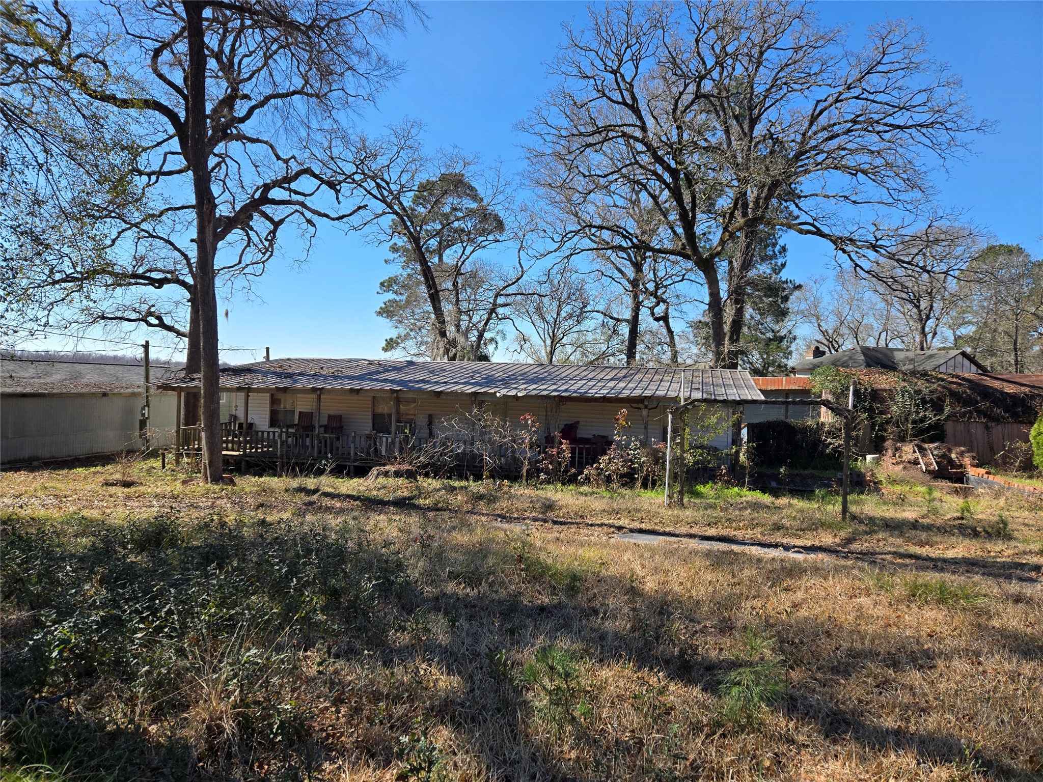 1188 Sportsman Drive Trinity, TX 75862 - Photo 3 of 26 a view of a park that has a tree on the side