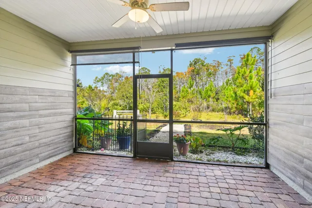 a view of a entryway door front of a house