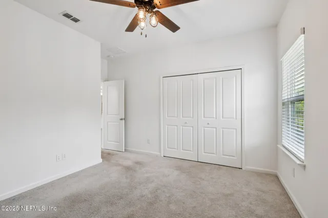 a view of a porch with a yard