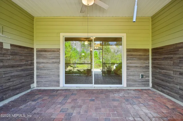 a view of a house with a yard and a garden