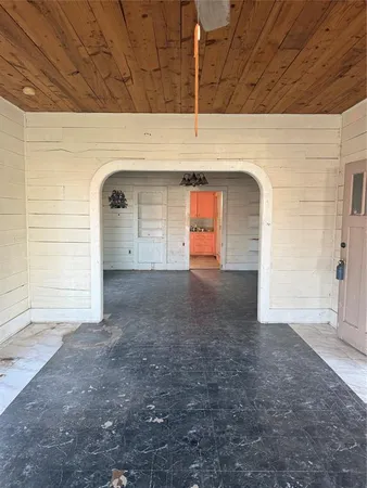 a view of empty room with garage