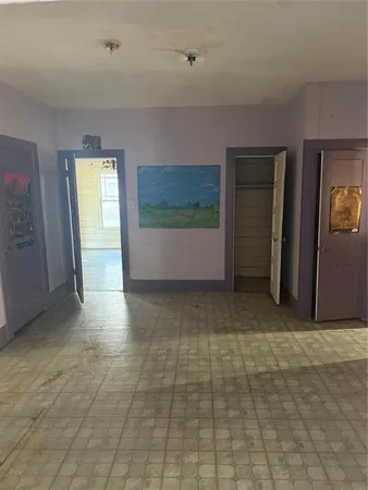 an empty room with windows