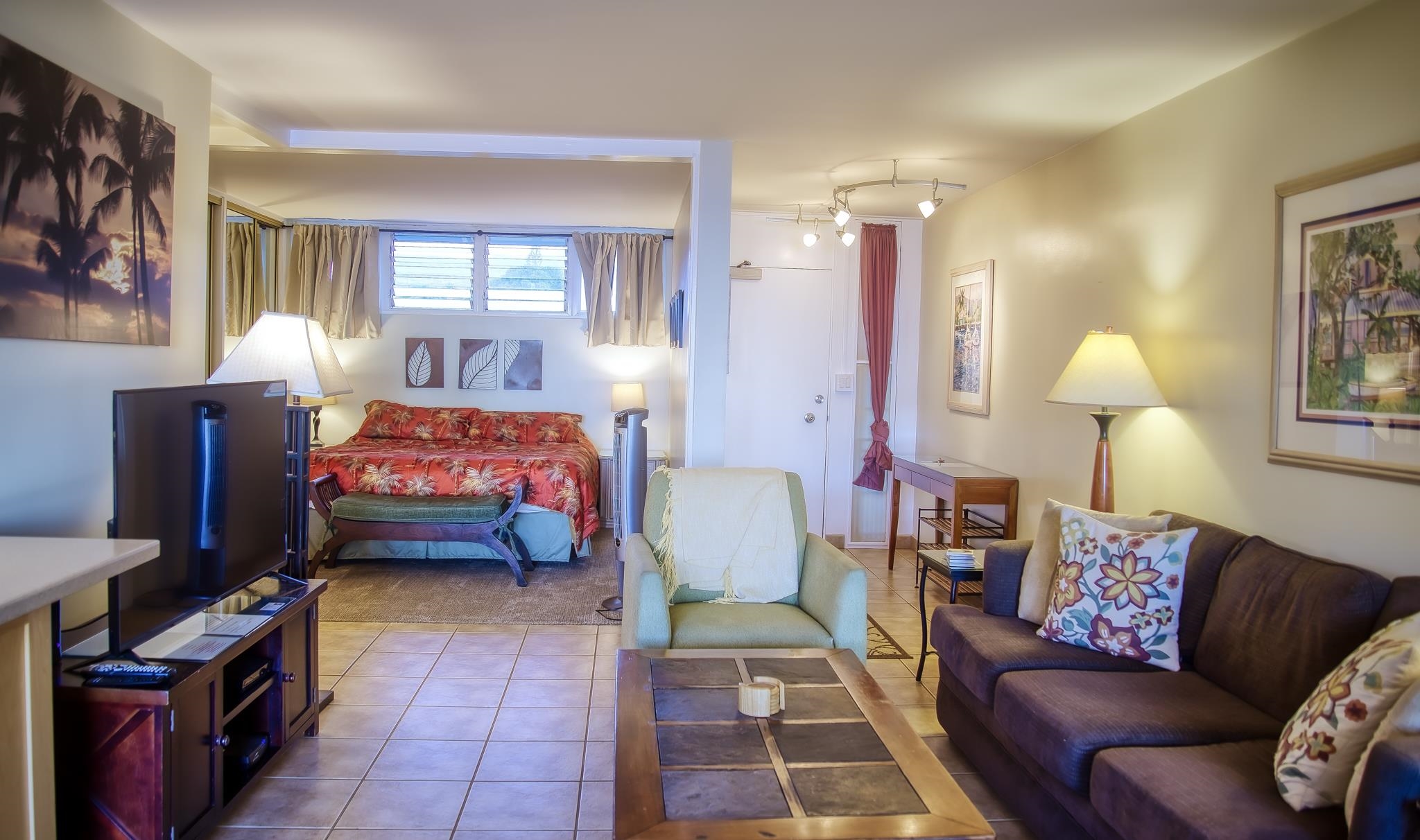 3823 Lower Honoapiilani Road, Unit 311 Lahaina, HI 96761 - Photo 14 of 20 a bedroom with furniture and a window