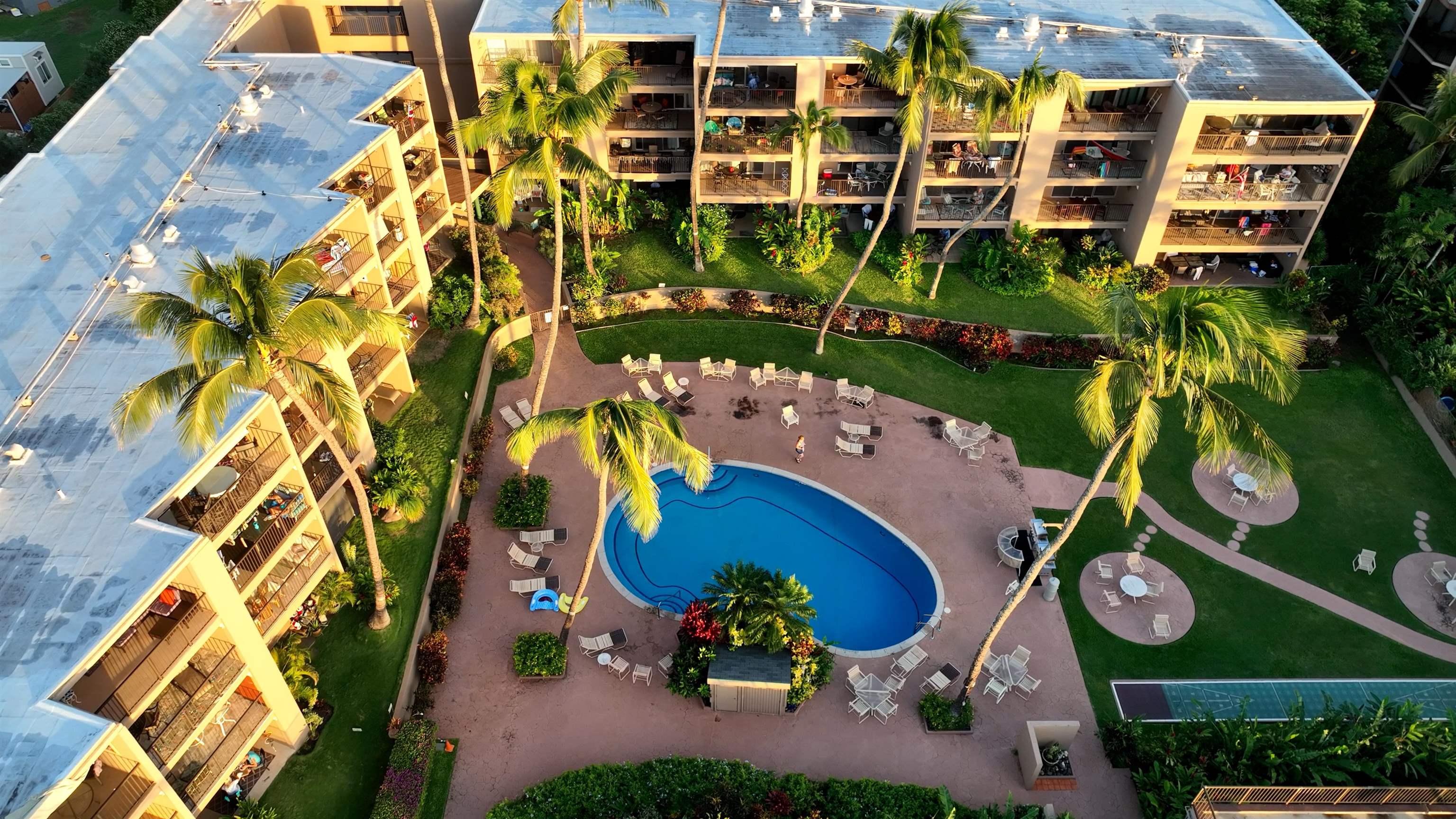 3823 Lower Honoapiilani Road, Unit 311 Lahaina, HI 96761 - Photo 18 of 20 aerial view of a swimming pool with outdoor space and sitting space
