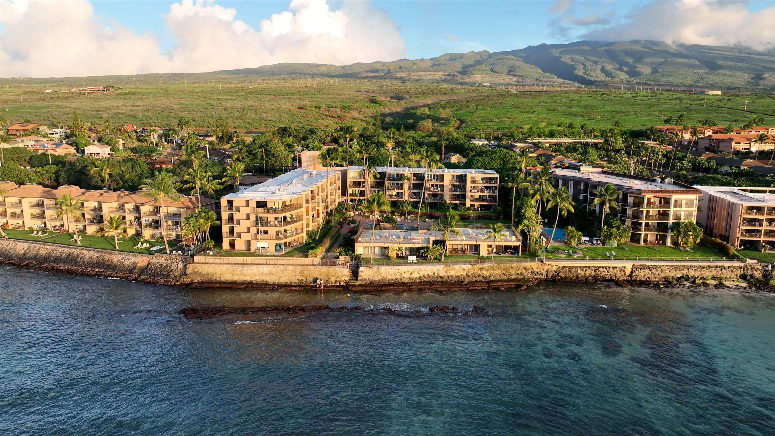 3823 Lower Honoapiilani Road, Unit 311 Lahaina, HI 96761 - Photo 19 of 20 a view of a city with an ocean beach