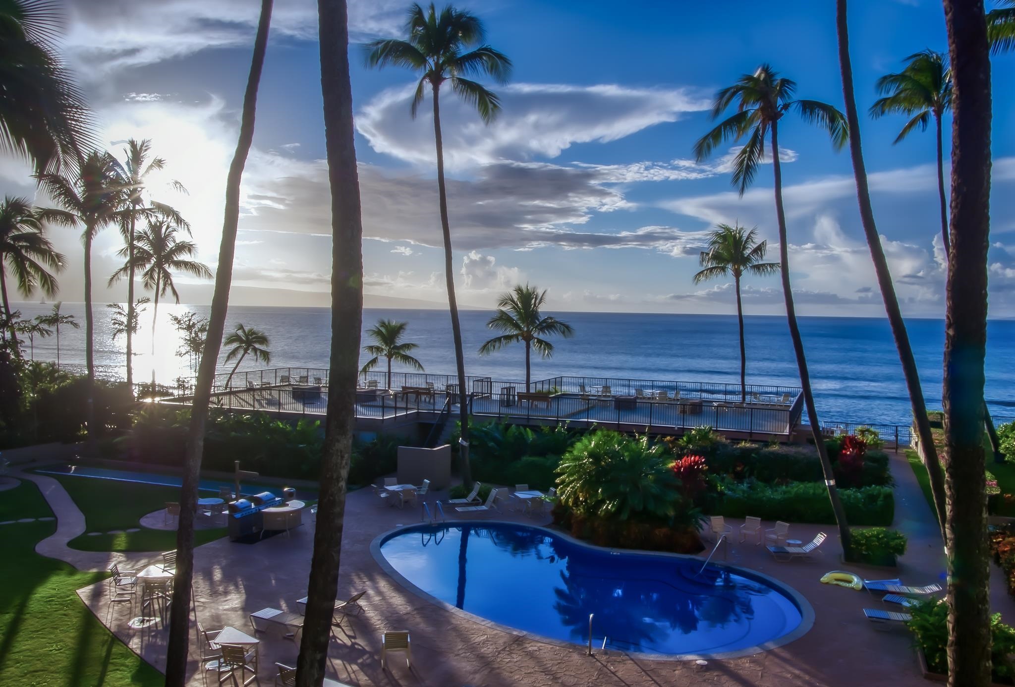 3823 Lower Honoapiilani Road, Unit 311 Lahaina, HI 96761 - Photo 20 of 20 a view of a swimming pool with a patio
