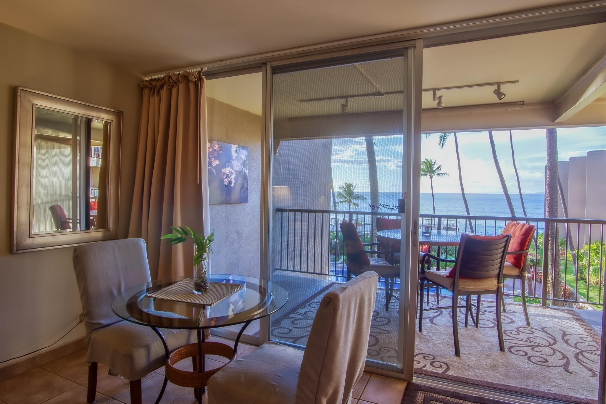 3823 Lower Honoapiilani Road, Unit 311 Lahaina, HI 96761 - Photo 9 of 20 a view of a dining room with furniture window and outside view