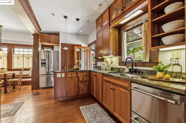 a view of hallway with wooden floor