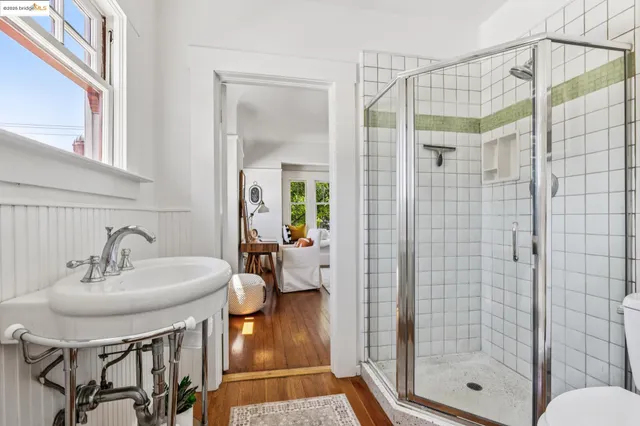 a view of a dining room with furniture and windows