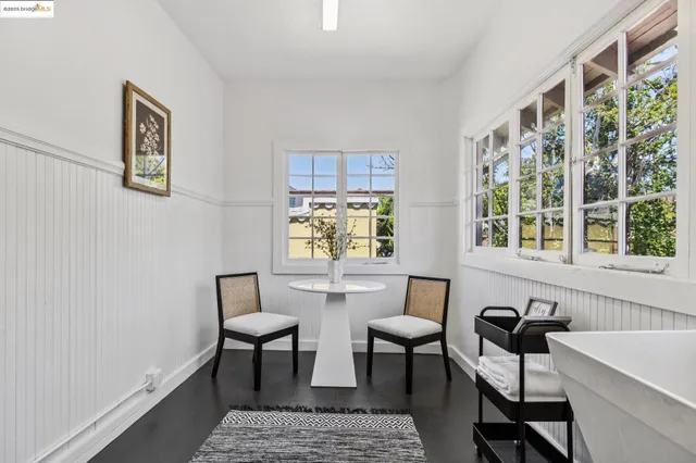 a view of a livingroom with entryway and stairs