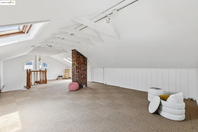 a front view of a house with sitting area