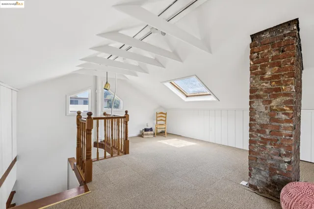 a view of a chairs and table in a patio