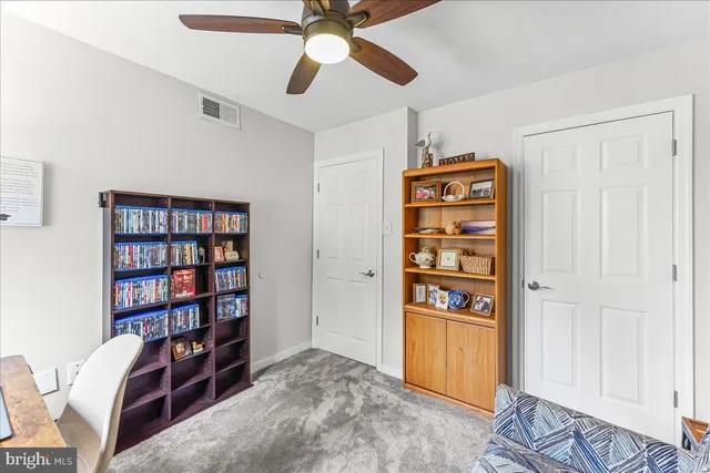 a view of park with an outdoor seating