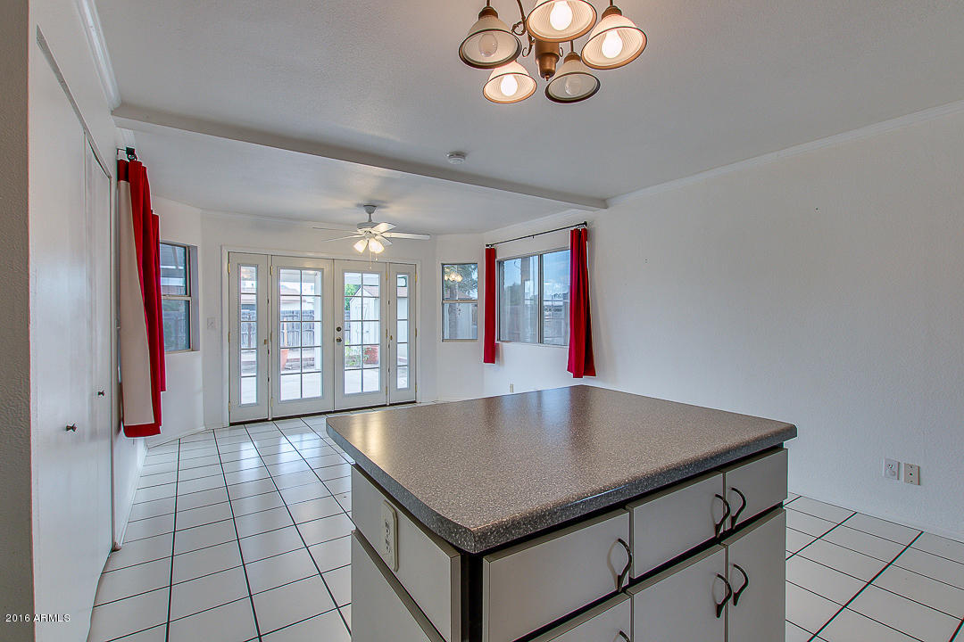 3311 East Bloomfield Road Phoenix, AZ 85032 - Photo 19 of 46 a room with pool table and windows