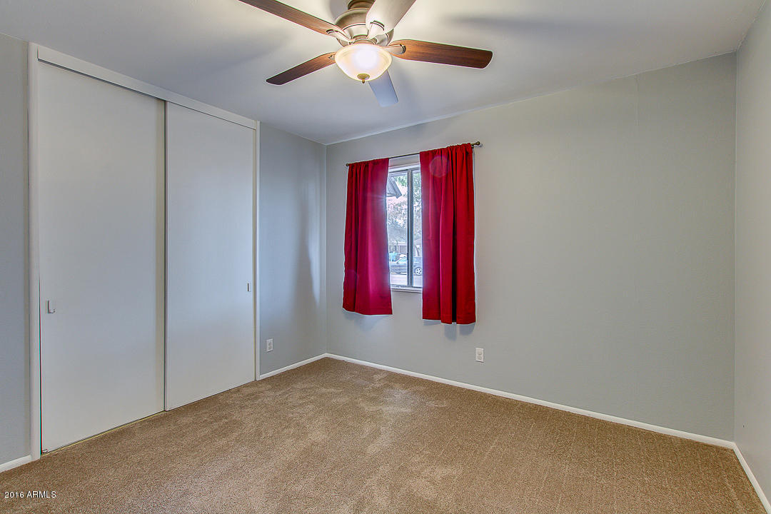 3311 East Bloomfield Road Phoenix, AZ 85032 - Photo 30 of 46 a view of a room with window and a ceiling fan