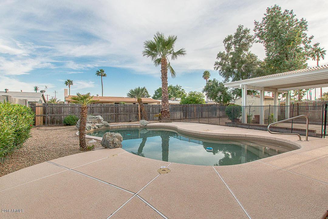 3311 East Bloomfield Road Phoenix, AZ 85032 - Photo 41 of 46 a view of a swimming pool with a patio