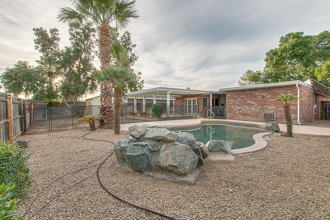 3311 East Bloomfield Road Phoenix, AZ 85032 - Photo 44 of 46 a view of a house with backyard and sitting area
