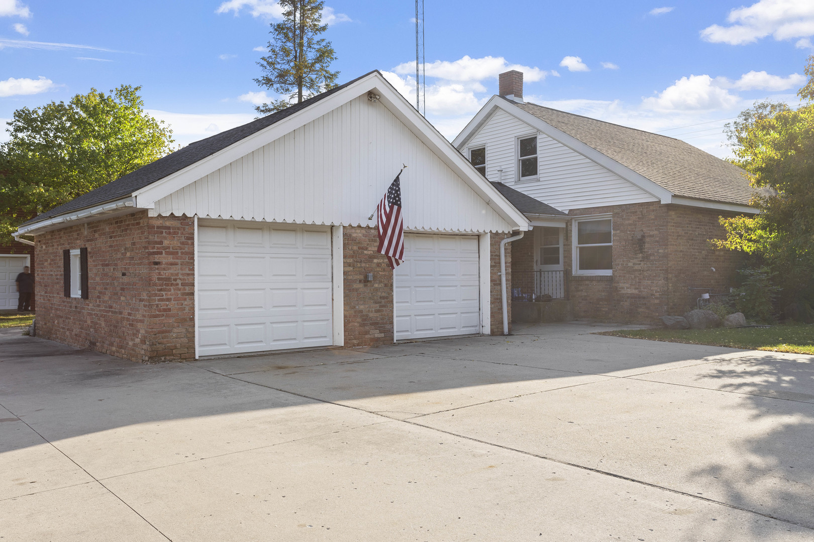 21517 Dunham Road Harvard, IL 60033 - Photo 16 of 36 a view of house with a yard and garage