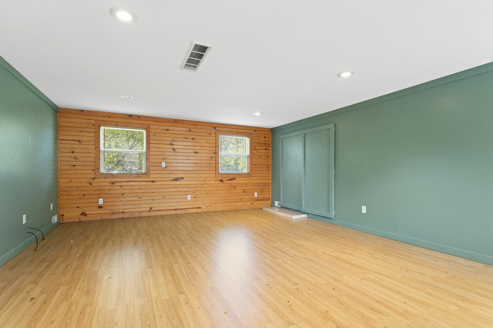 21517 Dunham Road Harvard, IL 60033 - Photo 26 of 36 a view of an empty room with wooden floor and a window