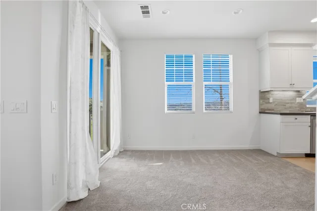a bathroom with a sink a toilet and vanity