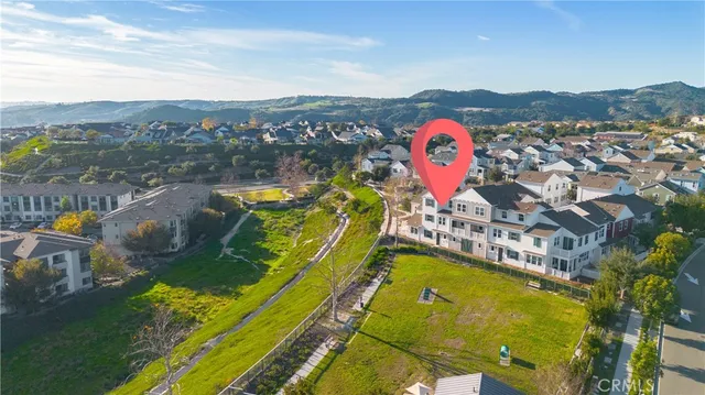 a view of a swimming pool with a lake view and mountain view