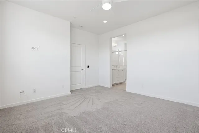 a view of a porch with a floor to ceiling window and stairs