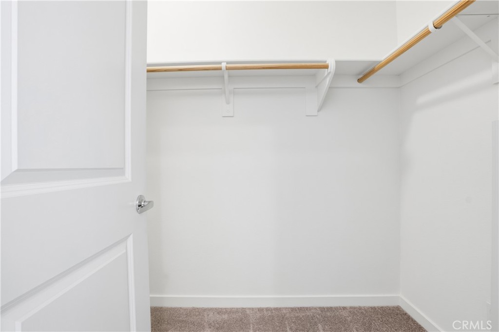 179 Patria Rancho Mission Viejo, CA 92694 - Photo 27 of 75 a view of small space with racks on the wall