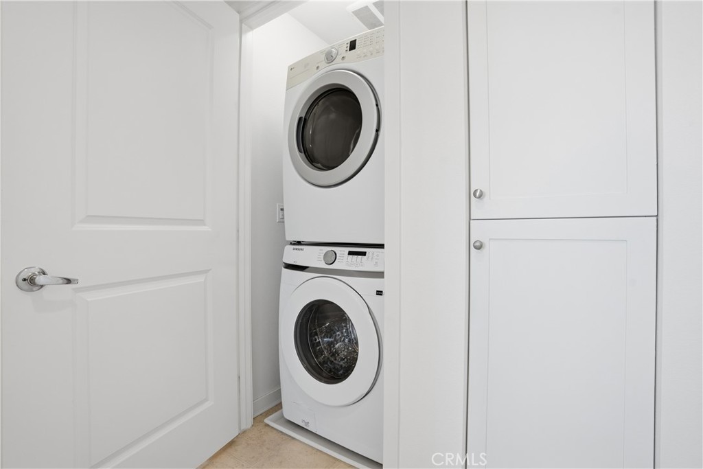 179 Patria Rancho Mission Viejo, CA 92694 - Photo 29 of 75 a utility room with dryer and washer