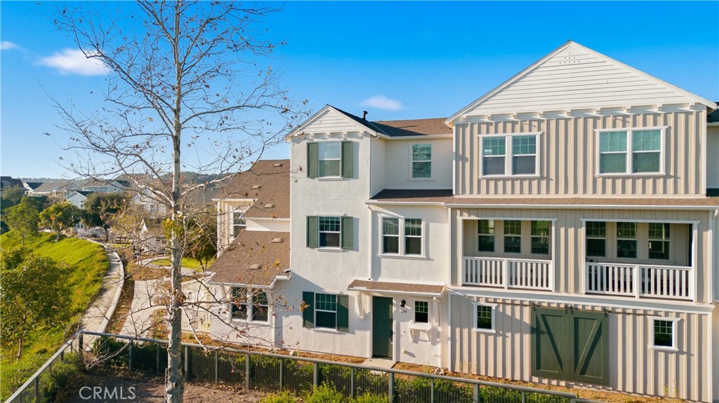 179 Patria Rancho Mission Viejo, CA 92694 - Photo 6 of 75 a view of a white house with large windows