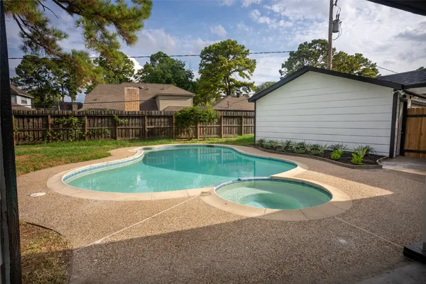 a view of outdoor space yard and swimming pool