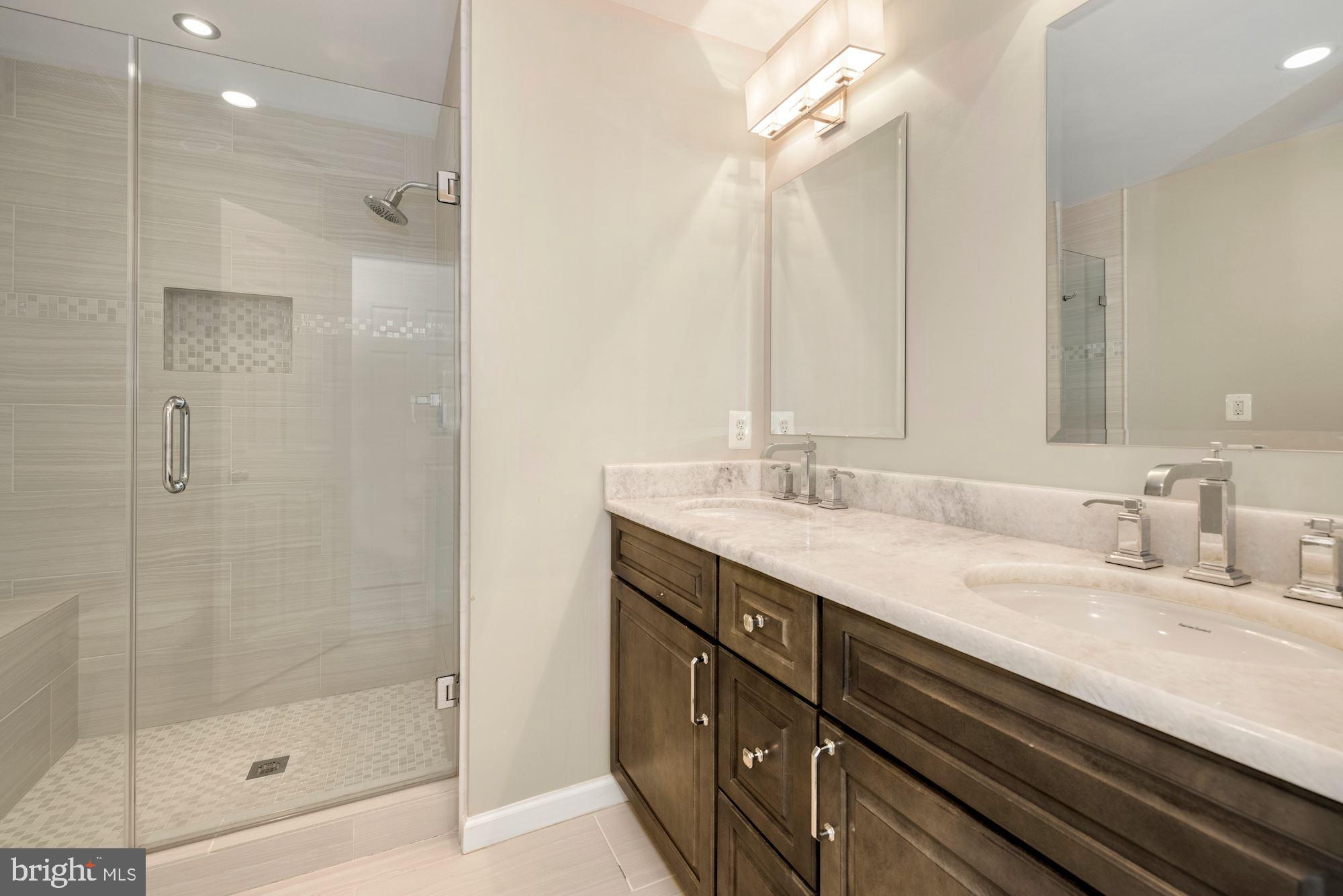 655 Main Street, Unit A Gaithersburg, MD 20878 - Photo 19 of 29 Renovated Primary Bathroom with dual vanity sinks