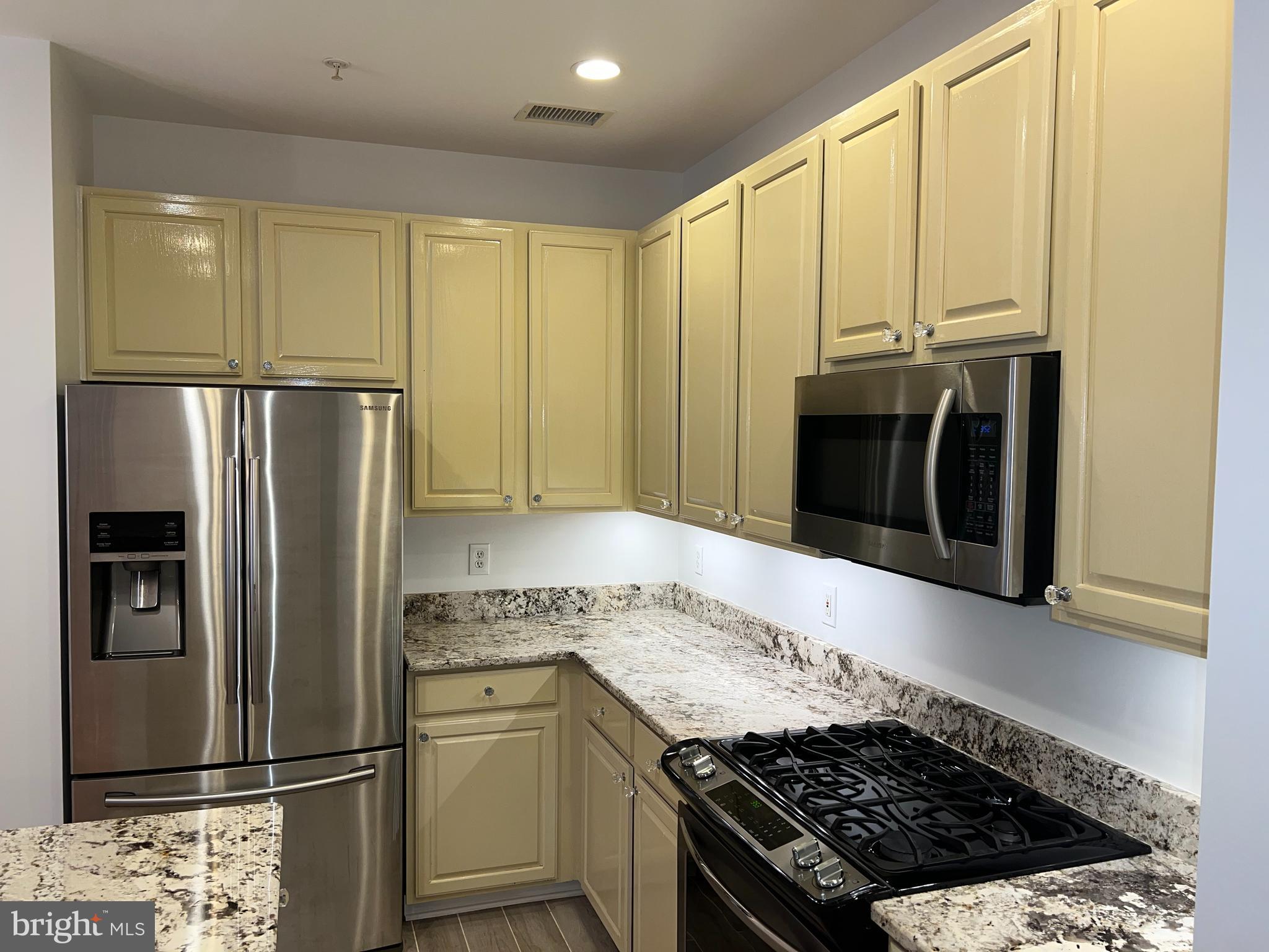 655 Main Street, Unit A Gaithersburg, MD 20878 - Photo 8 of 29 Recessed Lights & Newer Appliances
