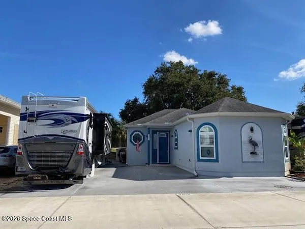 a view of a house with a garage