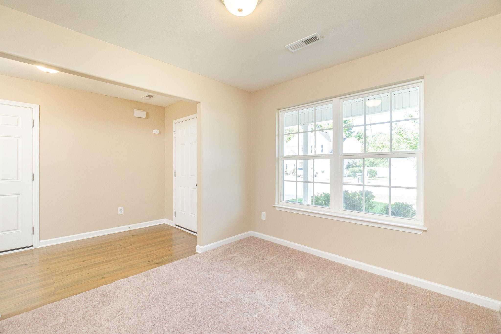 4816 Quarryman Road Raleigh, NC 27610 - Photo 24 of 25 Spacious dining room with open floor plan and new carpet Dining Room