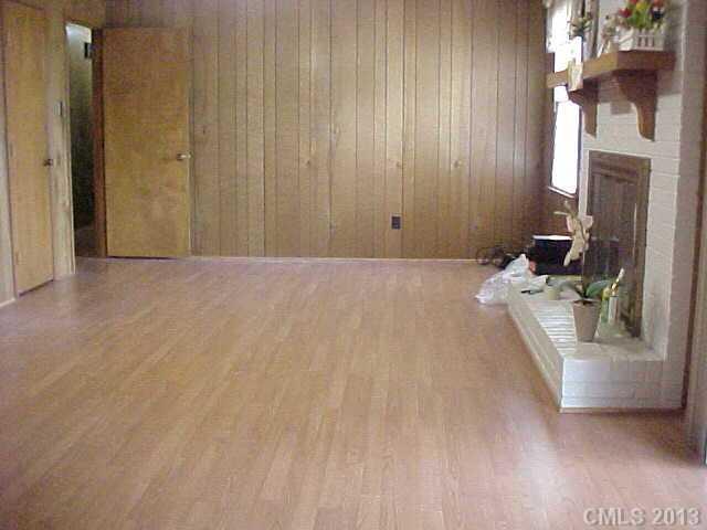720 Belleview Road Rock Hill, SC 29730 - Photo 11 of 16 a view of a bedroom with a bed and a fireplace