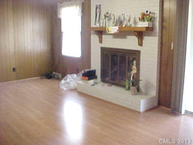 720 Belleview Road Rock Hill, SC 29730 - Photo 12 of 16 a view of living room with furniture and a fireplace