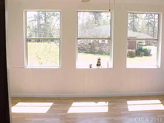 720 Belleview Road Rock Hill, SC 29730 - Photo 15 of 16 a view of empty room with wooden floor and fan