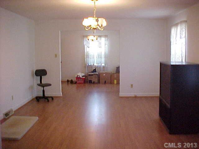 720 Belleview Road Rock Hill, SC 29730 - Photo 3 of 16 a living room with couches painting on wall and a window