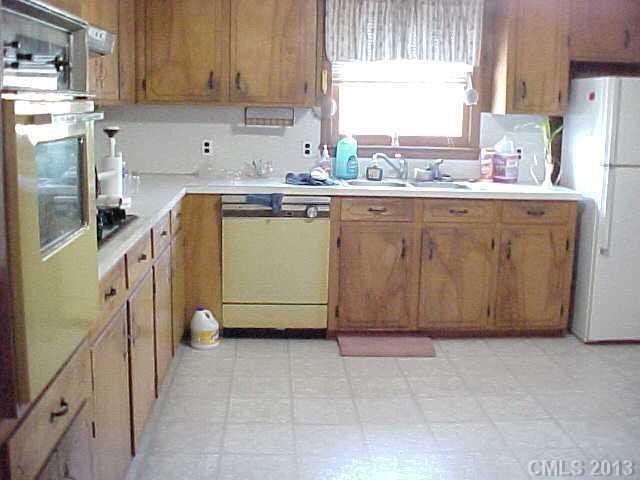 720 Belleview Road Rock Hill, SC 29730 - Photo 6 of 16 a utility room with a window a sink and a refrigerator