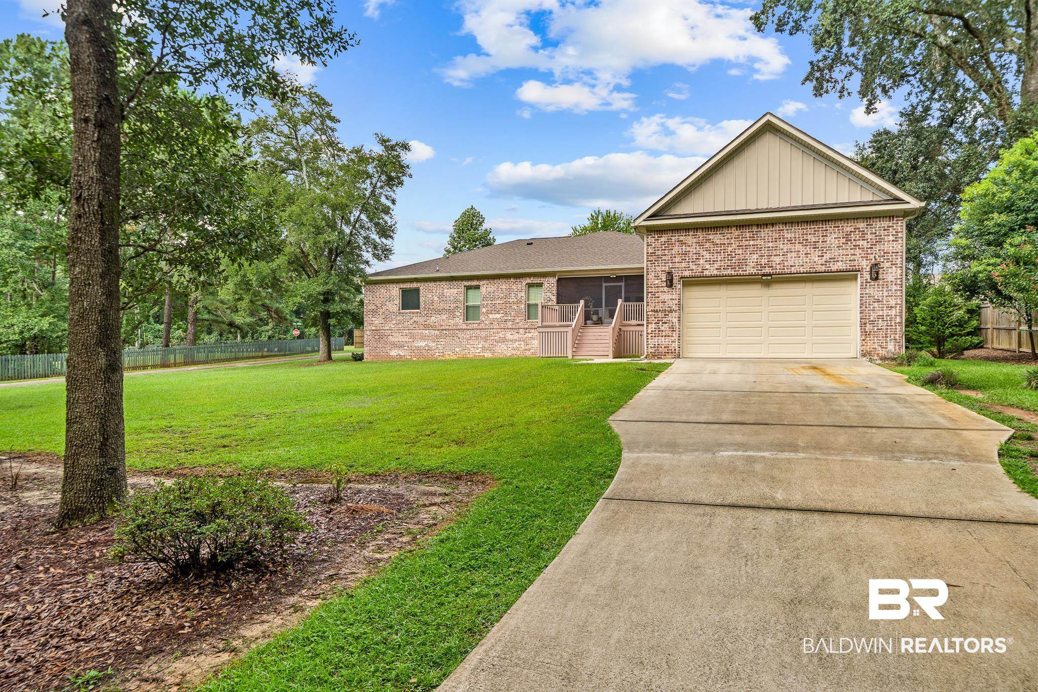 29530 St John Street Daphne, AL 36526 - Photo 38 of 38 View of front of home with a garage and a front lawn