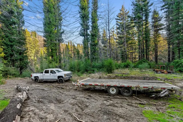 a view of street with parked cars